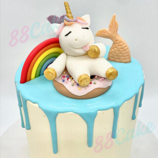 Lazy greedy unicorn cake with rainbow and mermaid tail and donut