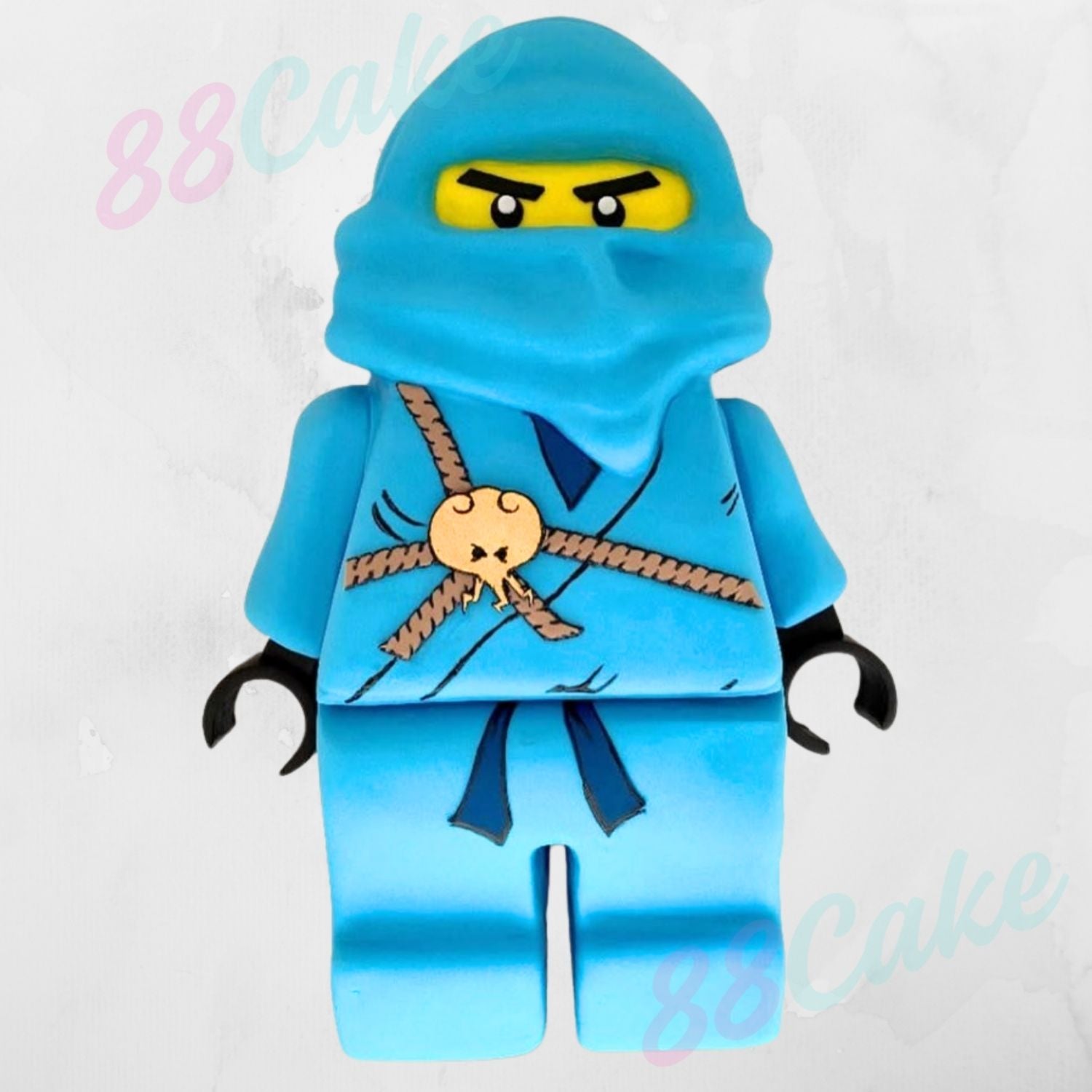 Blue Lego figure shaped cake