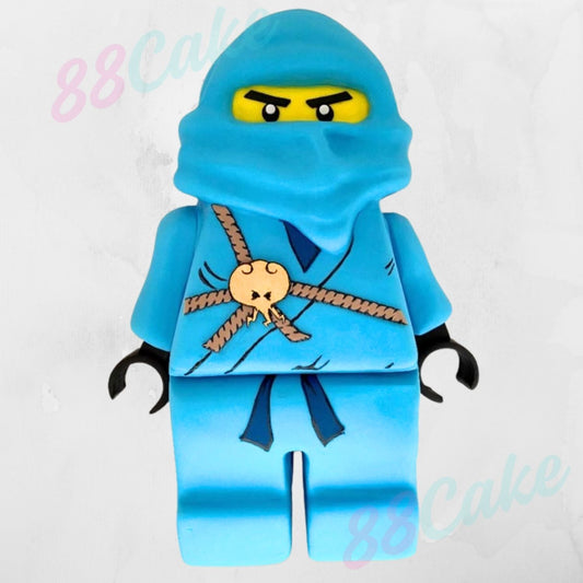 Blue Lego figure shaped cake
