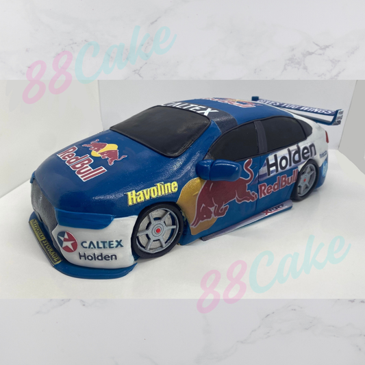 Car-shaped cake with Red Bull and Holden branding